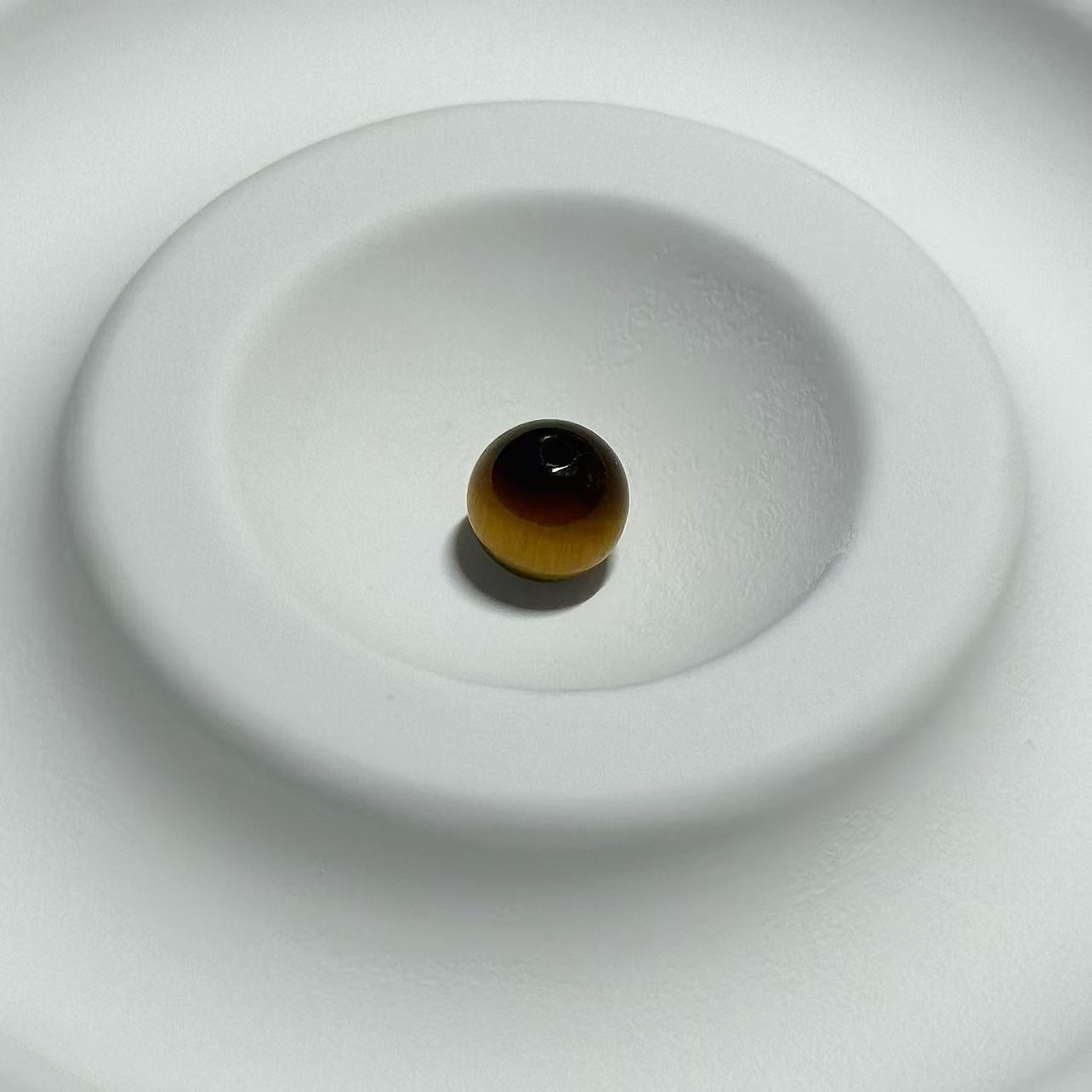 Golden Tiger's Courageous Gaze Stone