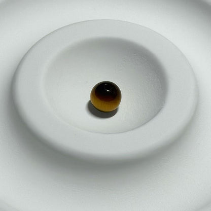 Golden Tiger's Courageous Gaze Stone