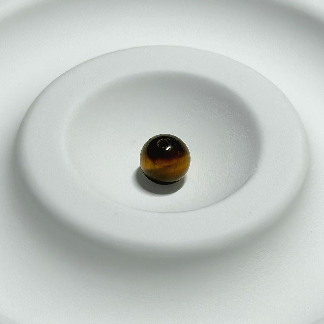 Golden Tiger's Courageous Gaze Stone