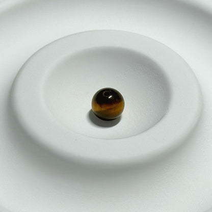 Golden Tiger's Courageous Gaze Stone